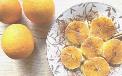 Sliced oranges with cinnamon and olive oil